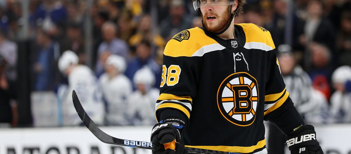 BOSTON, MASSACHUSETTS - APRIL 23: David Pastrnak #88 of the Boston Bruins looks on during the third period of Game Seven of the Eastern Conference First Round against the Toronto Maple Leafs during the 2019 NHL Stanley Cup Playoffs at TD Garden on April 23, 2019 in Boston, Massachusetts. The Bruins defeat the Maple Leafs 5-1.  (Photo by Maddie Meyer/Getty Images)